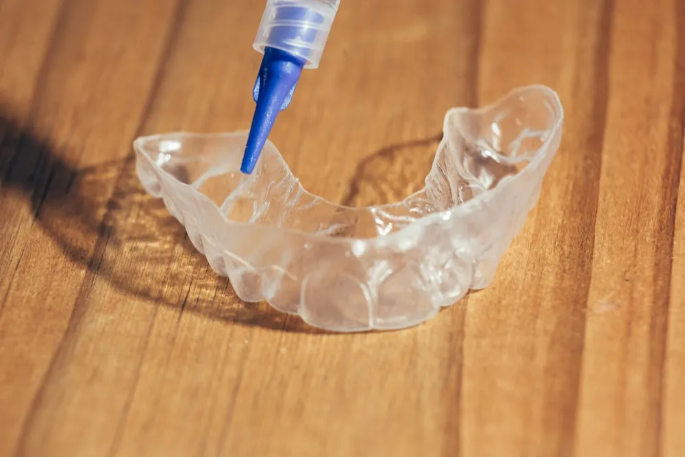 25897 cleaning teeth whitening tray
